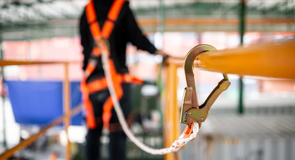 Safety harness and hook in use on site